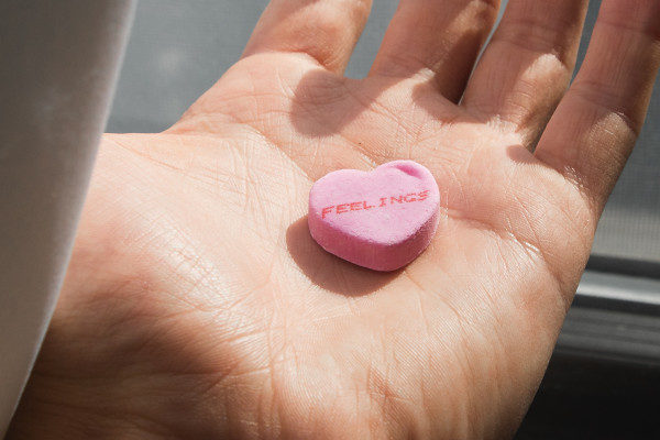 Picture of candy heart that says "feelings"