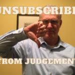 Picture of John Poelstra giving thumbs down on judgement