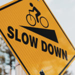Sign that says "slow down"
